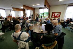 The audience listens to Tom O'Donnell at St. Michael's Episcopal Church.
