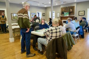Tom O'Donnell chats with supporters at the Bentonsport Stone House.