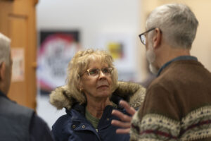 A woman listens to Tom O'Donnell at the Fairfield Public Library.